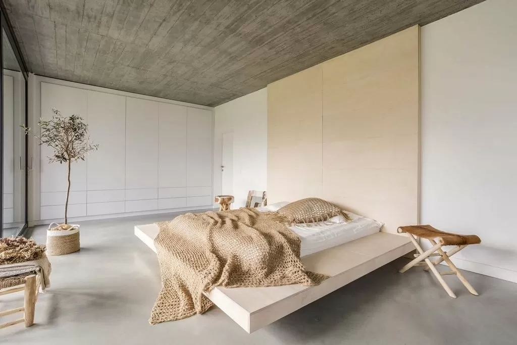 Woonbeton slaapkamer kleurverschillen herstelwerkzaamheden